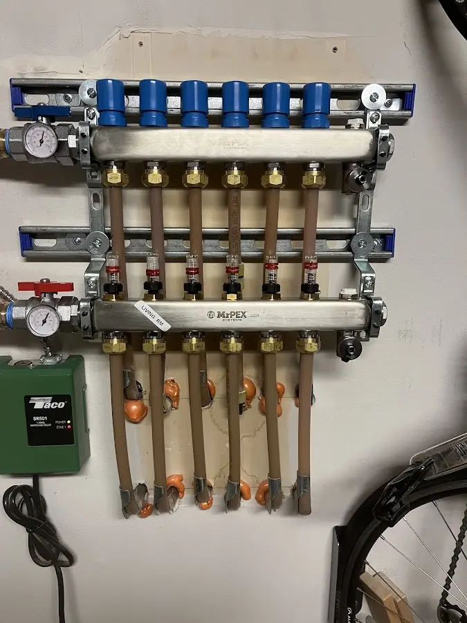 Plumber performing Water Heater Repair at a residential property in Florence